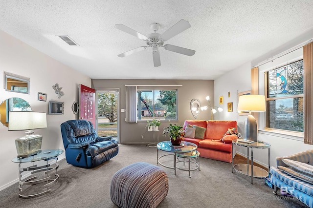 526 W Ariel Ave, Foley, AL 36535 - living room with ceiling fan, light colored carpet, and a textured ceiling