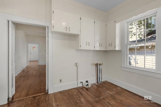 1706 Hunter Ave, Mobile, AL 36604 - laundry area featuring cabinet space, dark wood finished floors, crown molding, and hookup for a washing machine