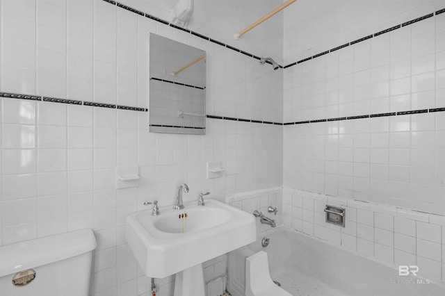 1706 Hunter Ave, Mobile, AL 36604 - bathroom with  shower combination and tile walls