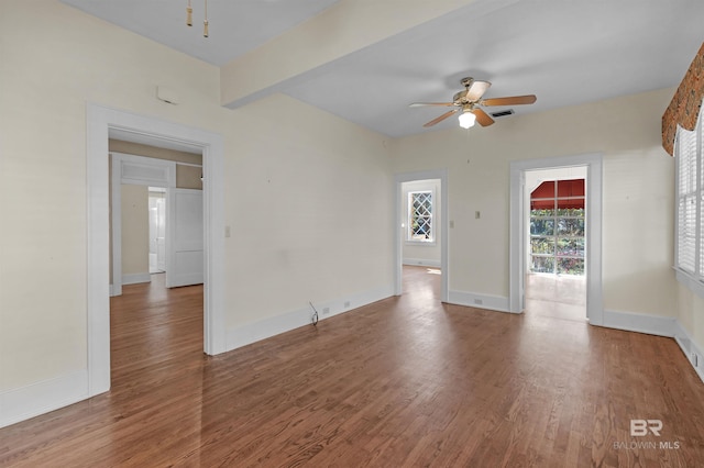 1706 Hunter Ave, Mobile, AL 36604 - spare room featuring ceiling fan, wood finished floors, and beamed ceiling