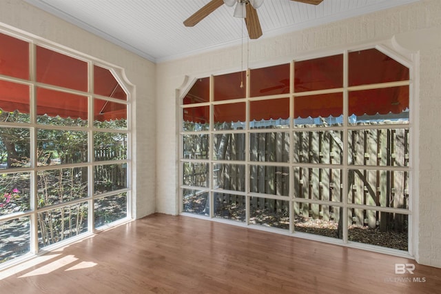 1706 Hunter Ave, Mobile, AL 36604 - spare room featuring a ceiling fan, wood finished floors, and ornamental molding
