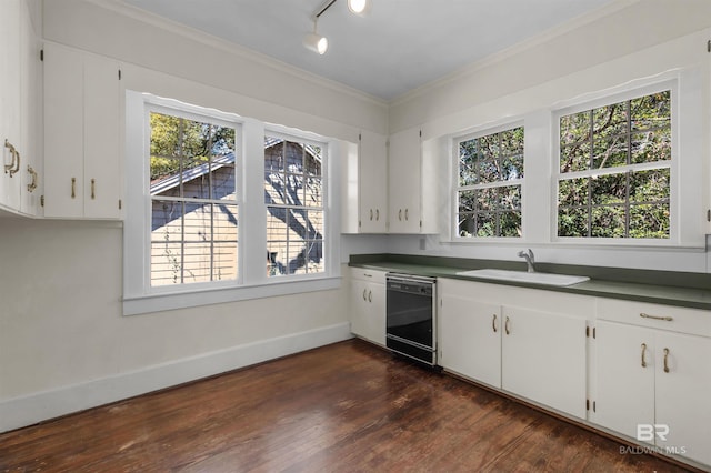 1706 Hunter Ave, Mobile, AL 36604 - kitchen with black dishwasher, dark wood-style flooring, crown molding, white cabinetry, and dark countertops