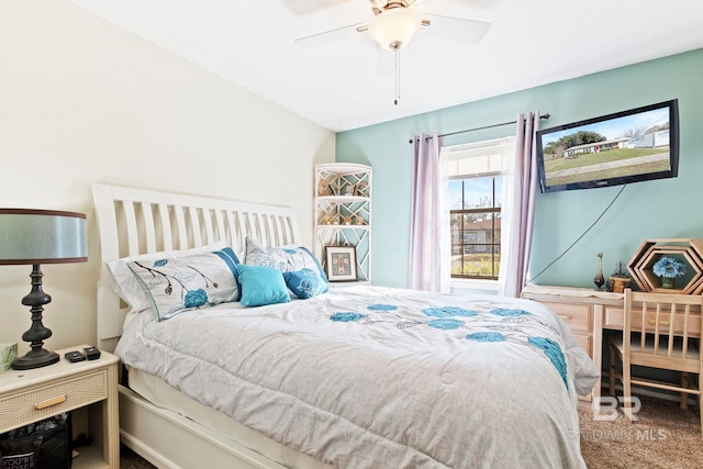 carpeted bedroom featuring ceiling fan