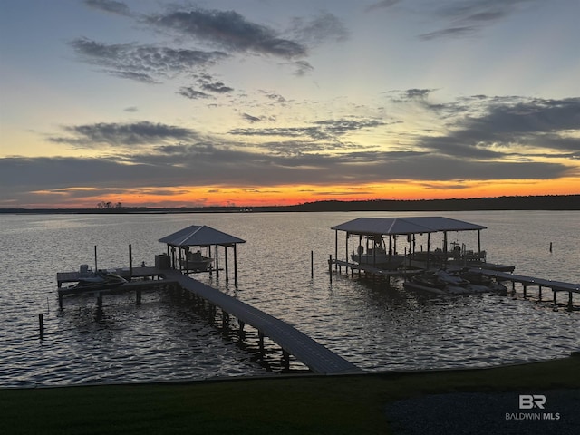 view of dock featuring a water view and boat lift