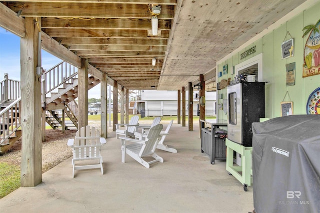 view of patio with stairway