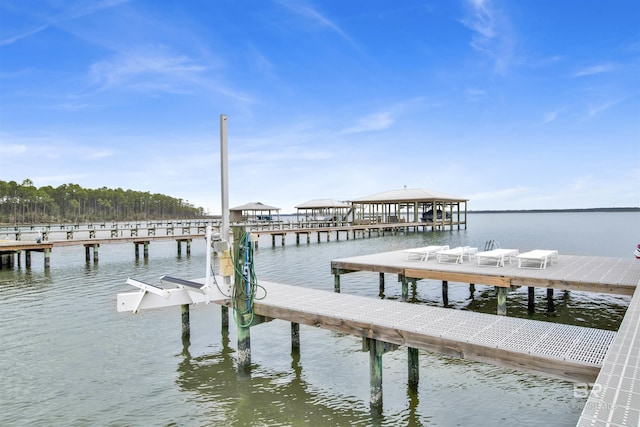view of dock with a water view