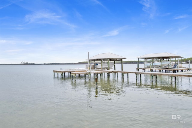 view of dock featuring a water view and boat lift