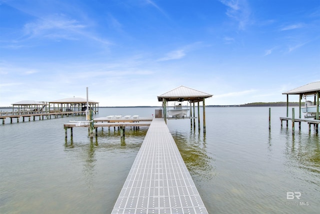 view of dock with a water view and boat lift