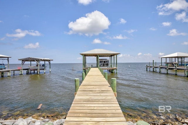8239 Gulf Beach Ln, Gulf Shores, AL 36542 - view of dock with boat lift and a water view