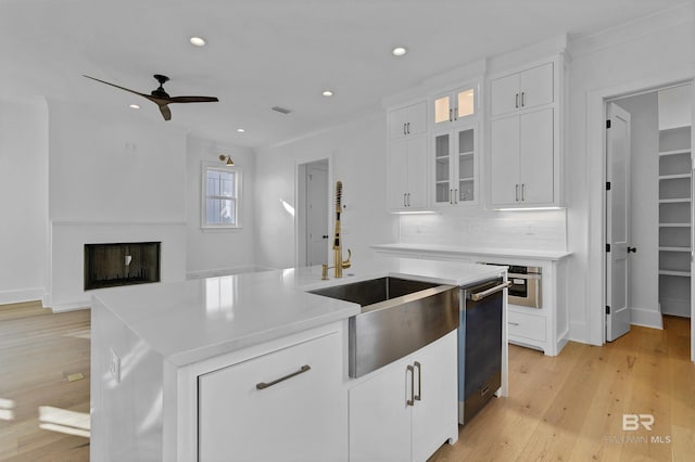 309-C S School St, Fairhope, AL 36532 - kitchen with dishwasher, ceiling fan, a sink, light countertops, and a kitchen island with sink
