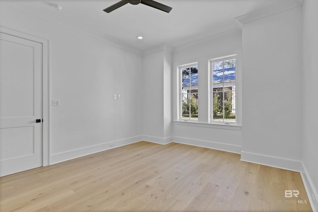309-C S School St, Fairhope, AL 36532 - spare room with crown molding, baseboards, a ceiling fan, and light wood-style floors