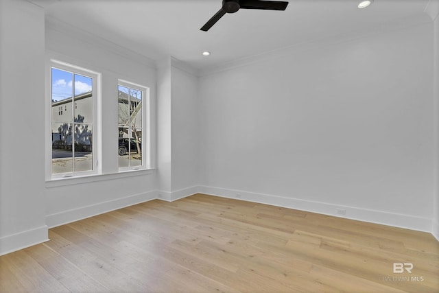309-C S School St, Fairhope, AL 36532 - empty room featuring baseboards, ornamental molding, light wood-style flooring, and a ceiling fan