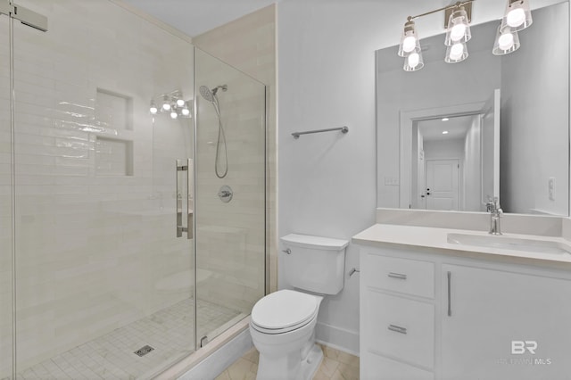 309-C S School St, Fairhope, AL 36532 - bathroom with toilet, baseboards, vanity, and a stall shower