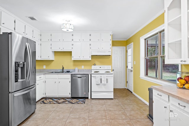 kitchen with white cabinetry, ornamental molding, appliances with stainless steel finishes, and sink