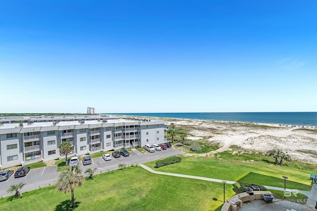 aerial view with a beach view and a water view