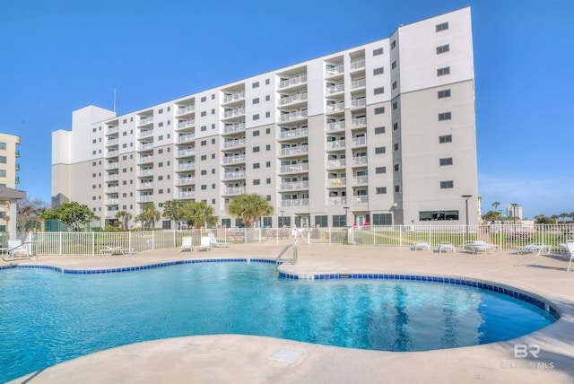 view of pool featuring a patio