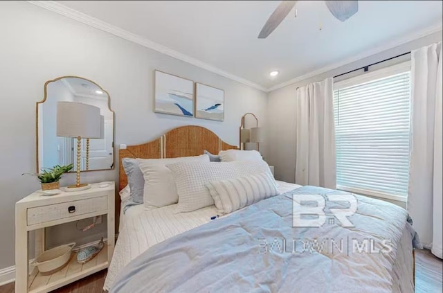 bedroom featuring a ceiling fan and crown molding