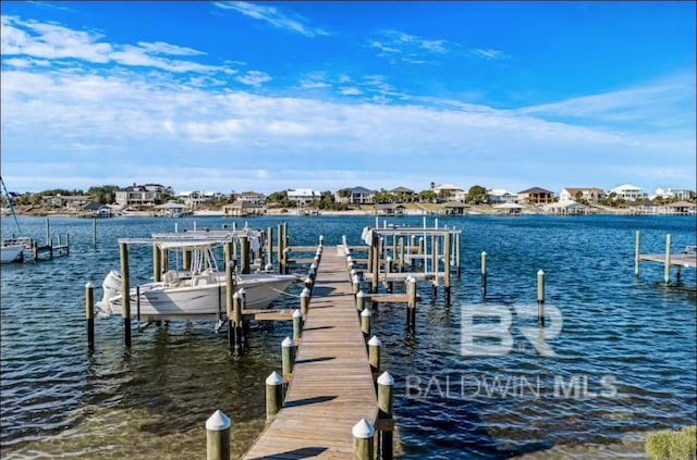 view of dock featuring a water view and boat lift