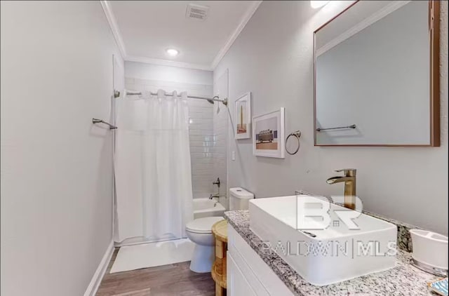 bathroom with toilet, visible vents, vanity, shower / bath combination with curtain, and crown molding