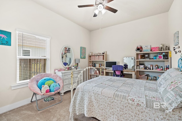 bedroom with baseboards, carpet floors, and ceiling fan