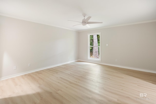 spare room with light hardwood / wood-style floors, ceiling fan, and ornamental molding