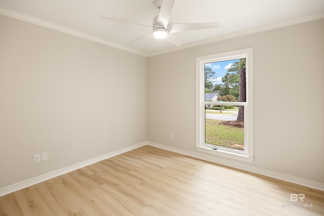 empty room with ornamental molding, light wood-type flooring, ceiling fan, and a healthy amount of sunlight