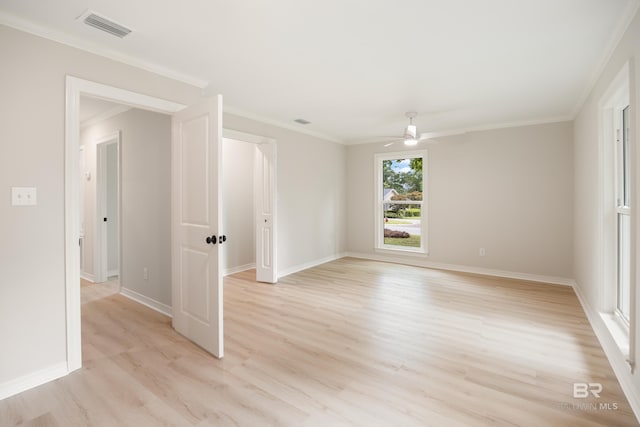 unfurnished room with crown molding, ceiling fan, and light wood-type flooring