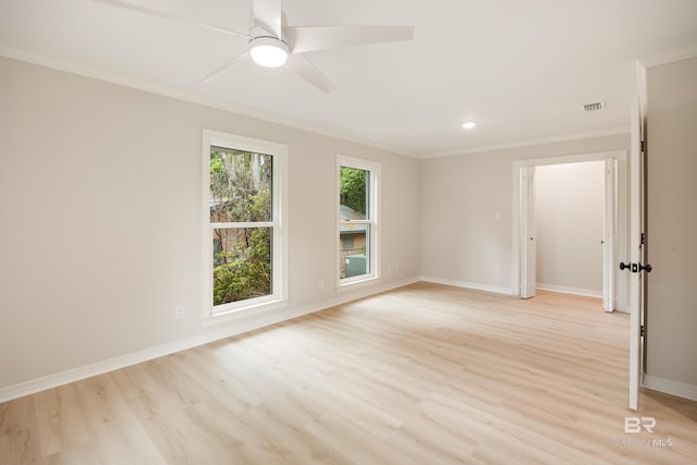 unfurnished room featuring light wood-type flooring, ceiling fan, and ornamental molding