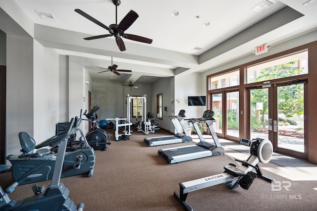 gym with french doors and ceiling fan