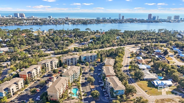 birds eye view of property with a water view