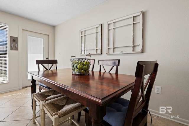 1069 W Beach Blvd Unit 5C, Gulf Shores, AL 36542 - dining room with plenty of natural light and light tile patterned floors