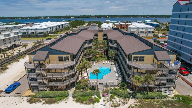 1069 W Beach Blvd Unit 5C, Gulf Shores, AL 36542 - drone / aerial view of a pool area