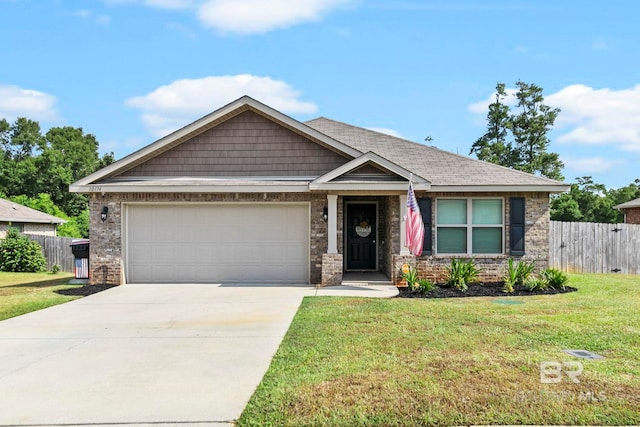 craftsman inspired home with a garage and a front yard