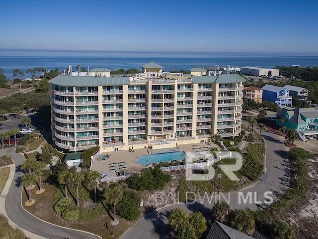 453 Dune Dr Unit 107, Gulf Shores, AL 36542 - aerial view of property and surrounding area with apartment complex / building, a pool area, and a nearby body of water