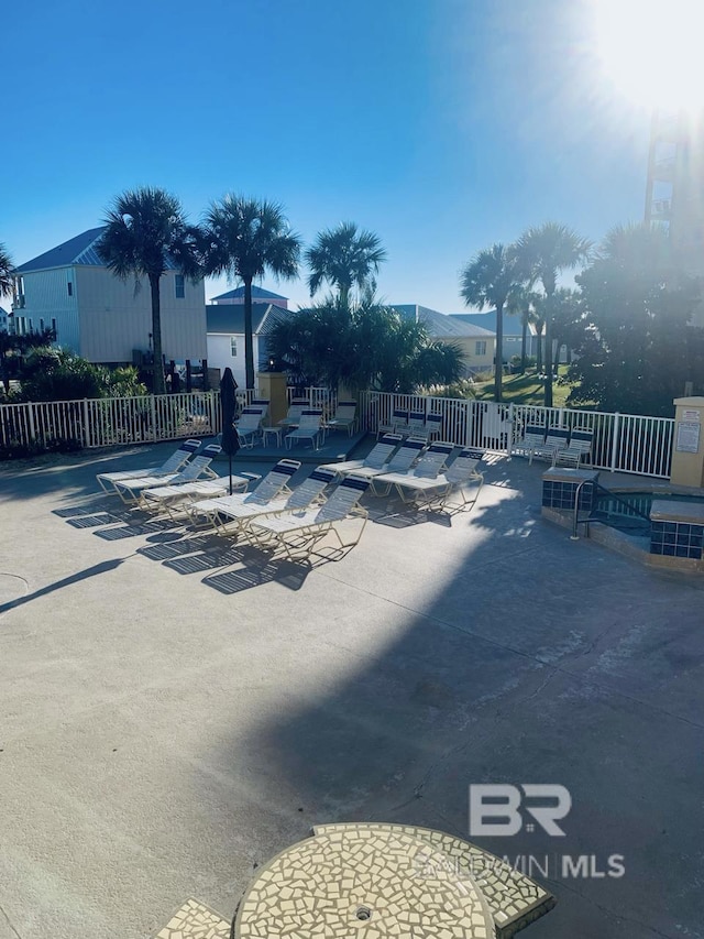 453 Dune Dr Unit 107, Gulf Shores, AL 36542 - view of yard with fence and a patio