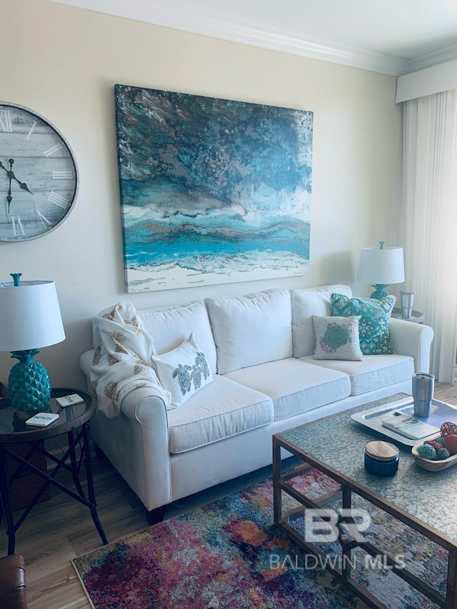 453 Dune Dr Unit 107, Gulf Shores, AL 36542 - living room featuring wood finished floors and crown molding