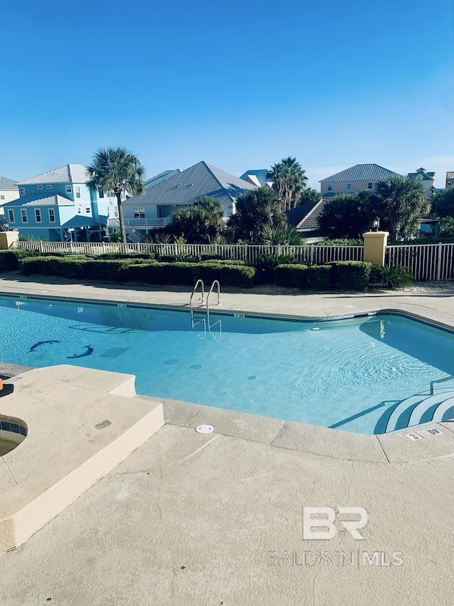 453 Dune Dr Unit 107, Gulf Shores, AL 36542 - community pool with fence