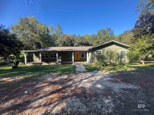 ranch-style house with a front yard