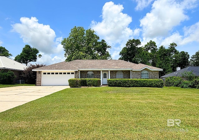 33580 Woodlands Dr, Lillian, AL 36549 - ranch-style home with a garage, concrete driveway, a front lawn, and brick siding