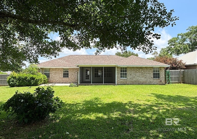 33580 Woodlands Dr, Lillian, AL 36549 - back of property with brick siding
