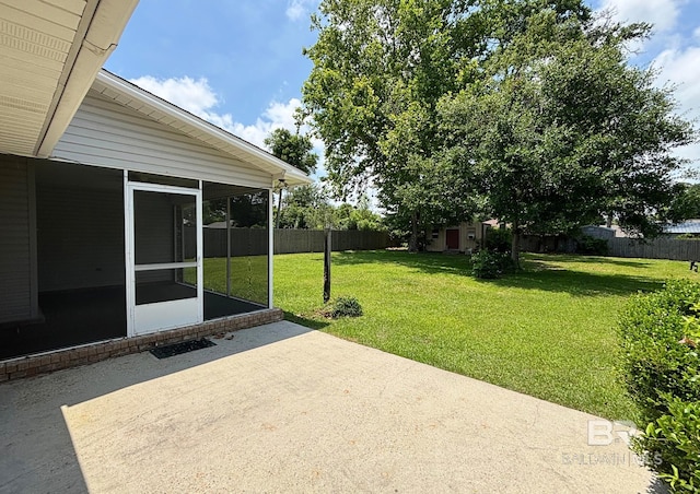 33580 Woodlands Dr, Lillian, AL 36549 - view of patio featuring a sunroom