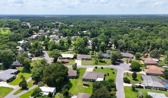33580 Woodlands Dr, Lillian, AL 36549 - aerial perspective of suburban area with a heavily wooded area