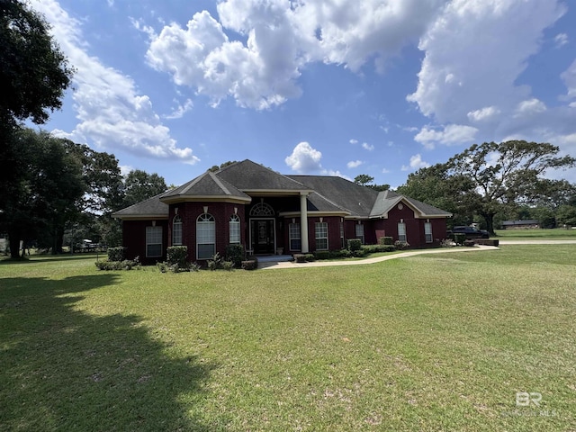 view of front of property with a front lawn