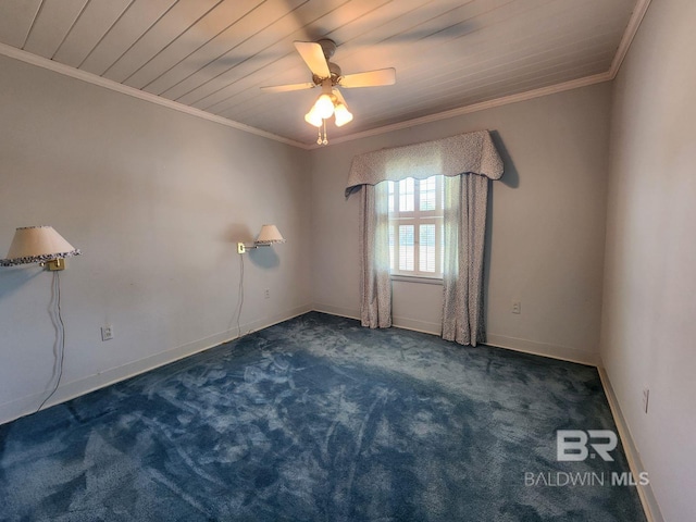 carpeted empty room featuring ornamental molding, ceiling fan, and wooden ceiling