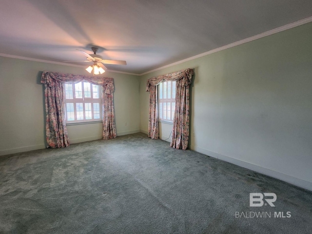 carpeted empty room featuring ceiling fan and ornamental molding