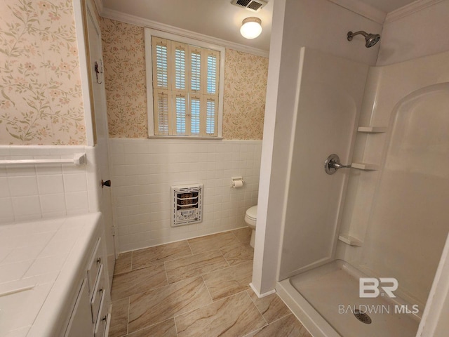 bathroom with walk in shower, crown molding, toilet, and heating unit