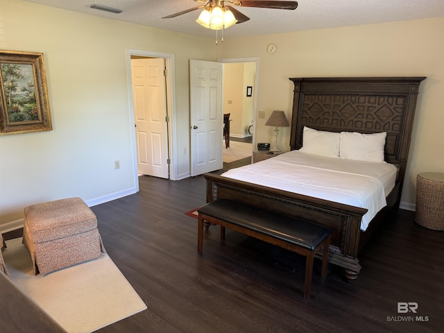 28712 Canal Rd, Orange Beach, AL 36561 - bedroom featuring wood finished floors, baseboards, and a ceiling fan