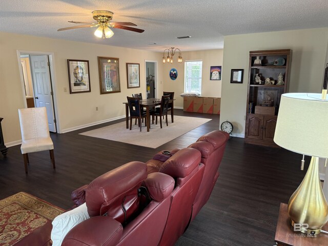 28712 Canal Rd, Orange Beach, AL 36561 - living room featuring wood finished floors, ceiling fan, baseboards, and a textured ceiling