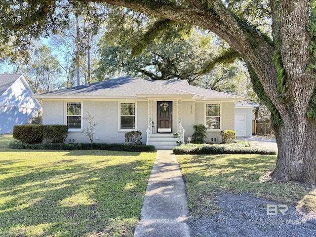 single story home with brick siding, a shingled roof, crawl space, a garage, and a front lawn