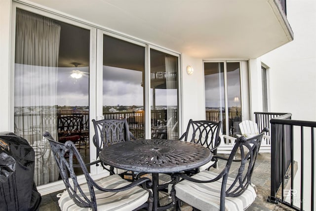 balcony with outdoor dining area